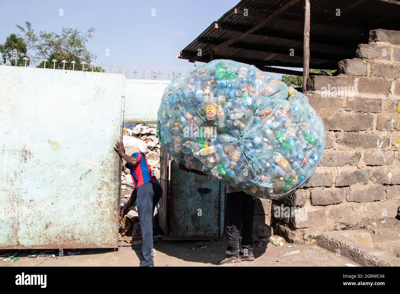 Nakuru, Kenya. 01st Oct, 2021. A waste picker is seen arriving with a
