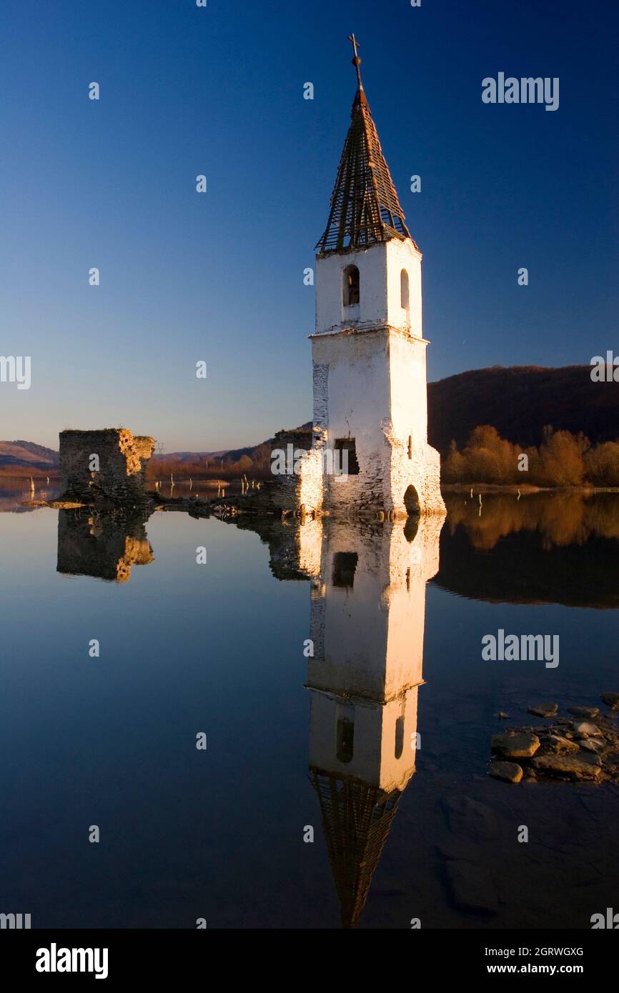 The ruins of a catholic church on the surface of Lake Bezid, the artificial dam that flooded the town. The church collapsed in 2014. Stock Photo