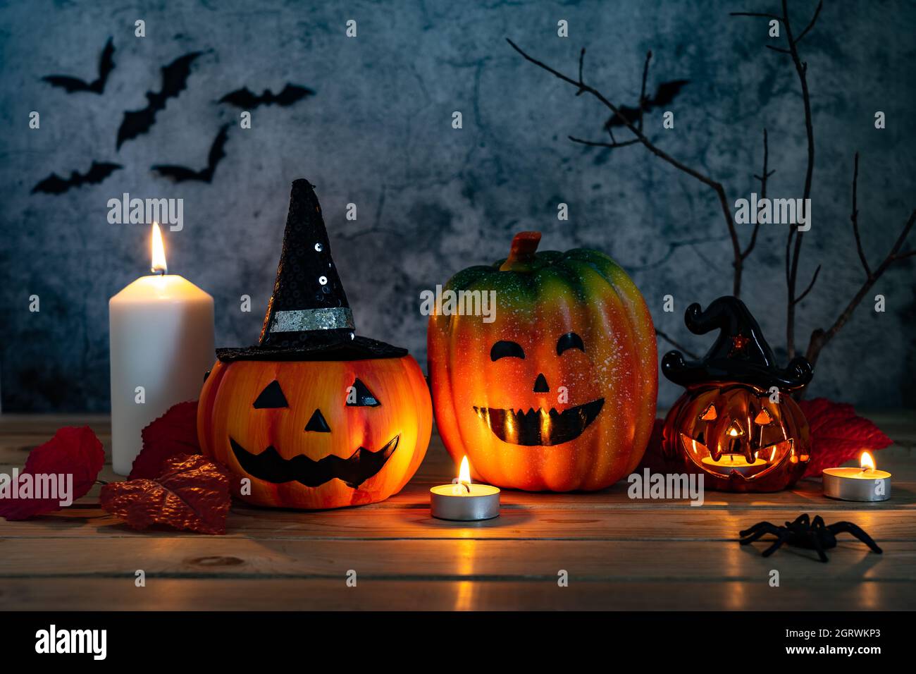 Close-up Of Halloween Decorations On Table Against Wall Stock Photo - Alamy