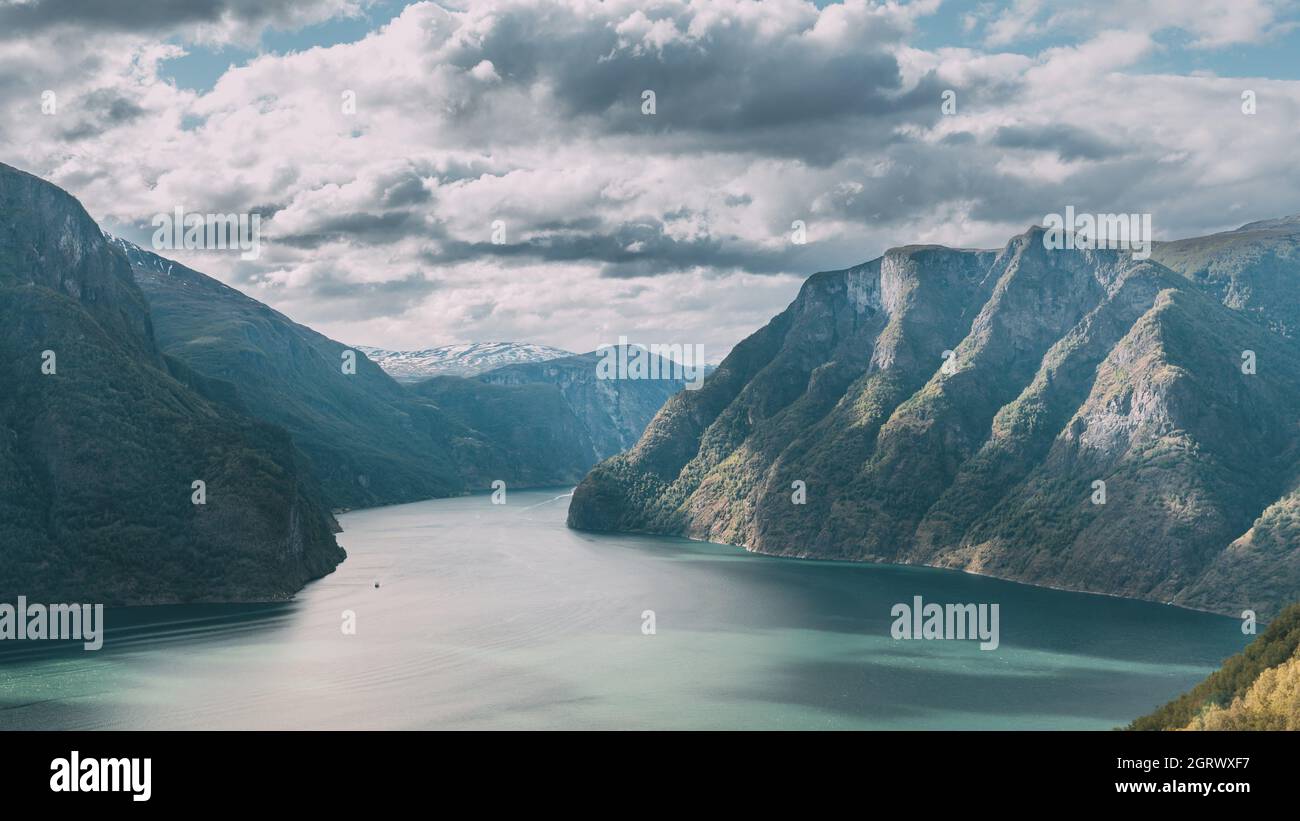 Aurland, Sogn And Fjordane Fjord, Norway. Amazing Summer Scenic View Of Sogn Og Fjordane. Ship Or Ferry Boat Liner Floating In Famous Norwegian Stock Photo