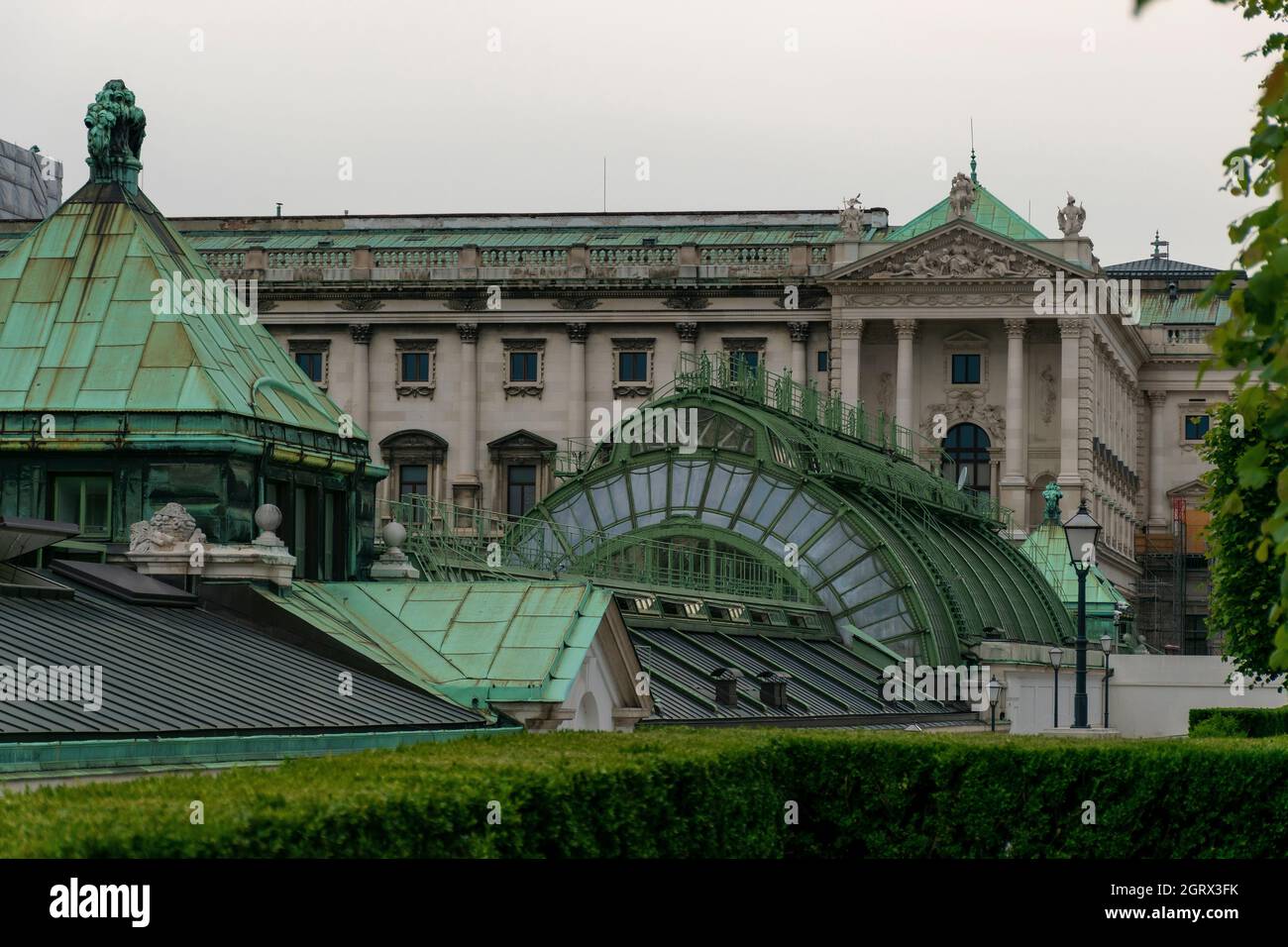 30 May 2019 Vienna, Austria - Schmetterlinghaus and Palmenhaus of Hofburg palace (Butterfly house and Palm house). Cloudy sky Stock Photo