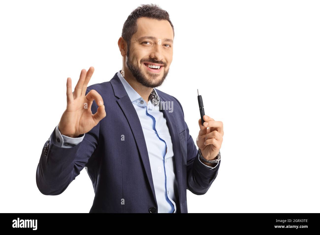 Man with an electronic cigarette smiling and gesturing a good sign isolated on white background Stock Photo