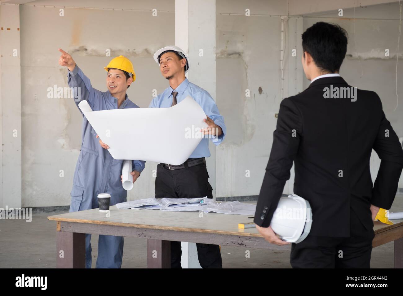 Professional engineer are planning construction Stock Photo Alamy