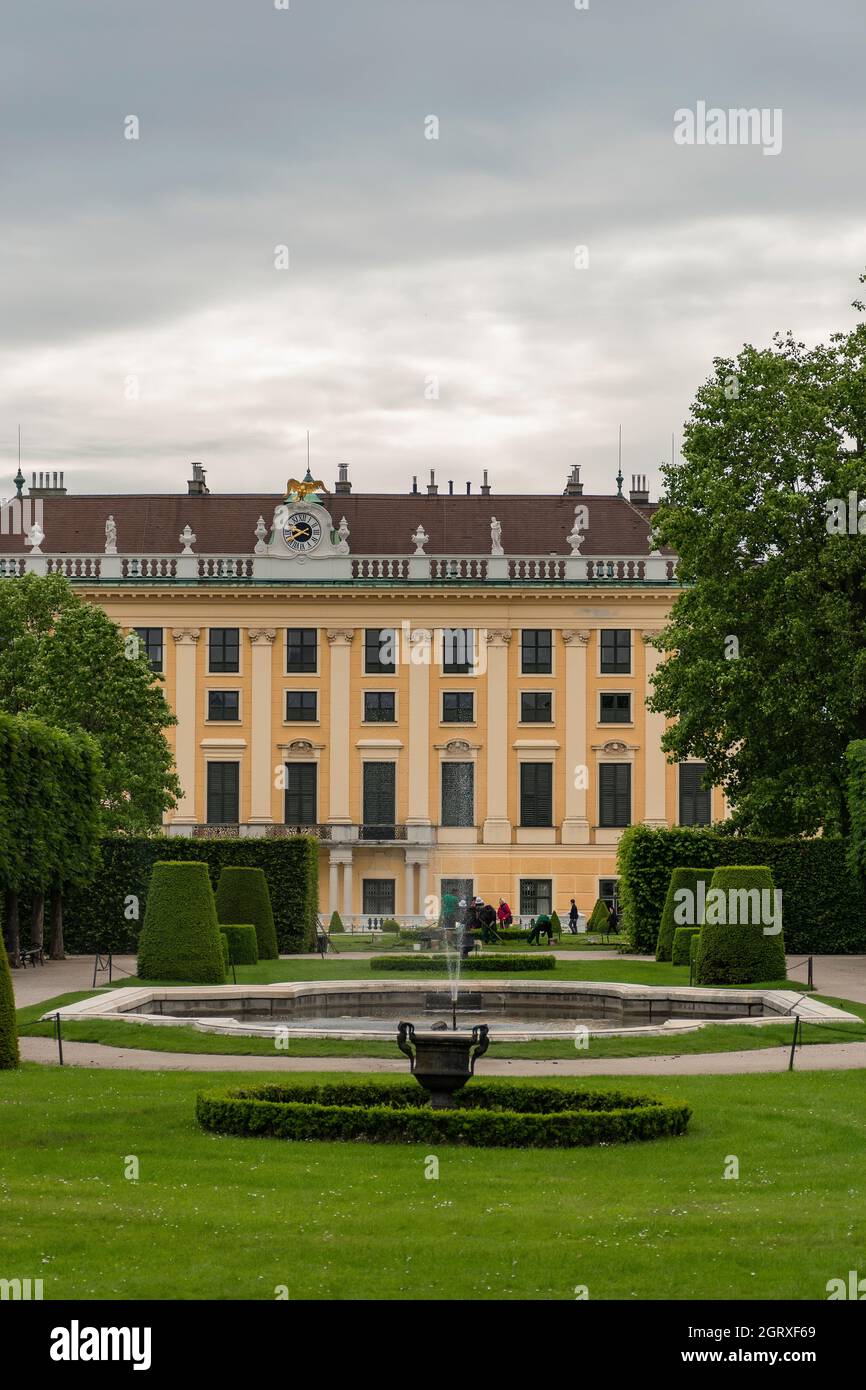 31 May 2019 Vienna, Austria - Schonbrunn palace building among gardens. Cloudy springtime day Stock Photo