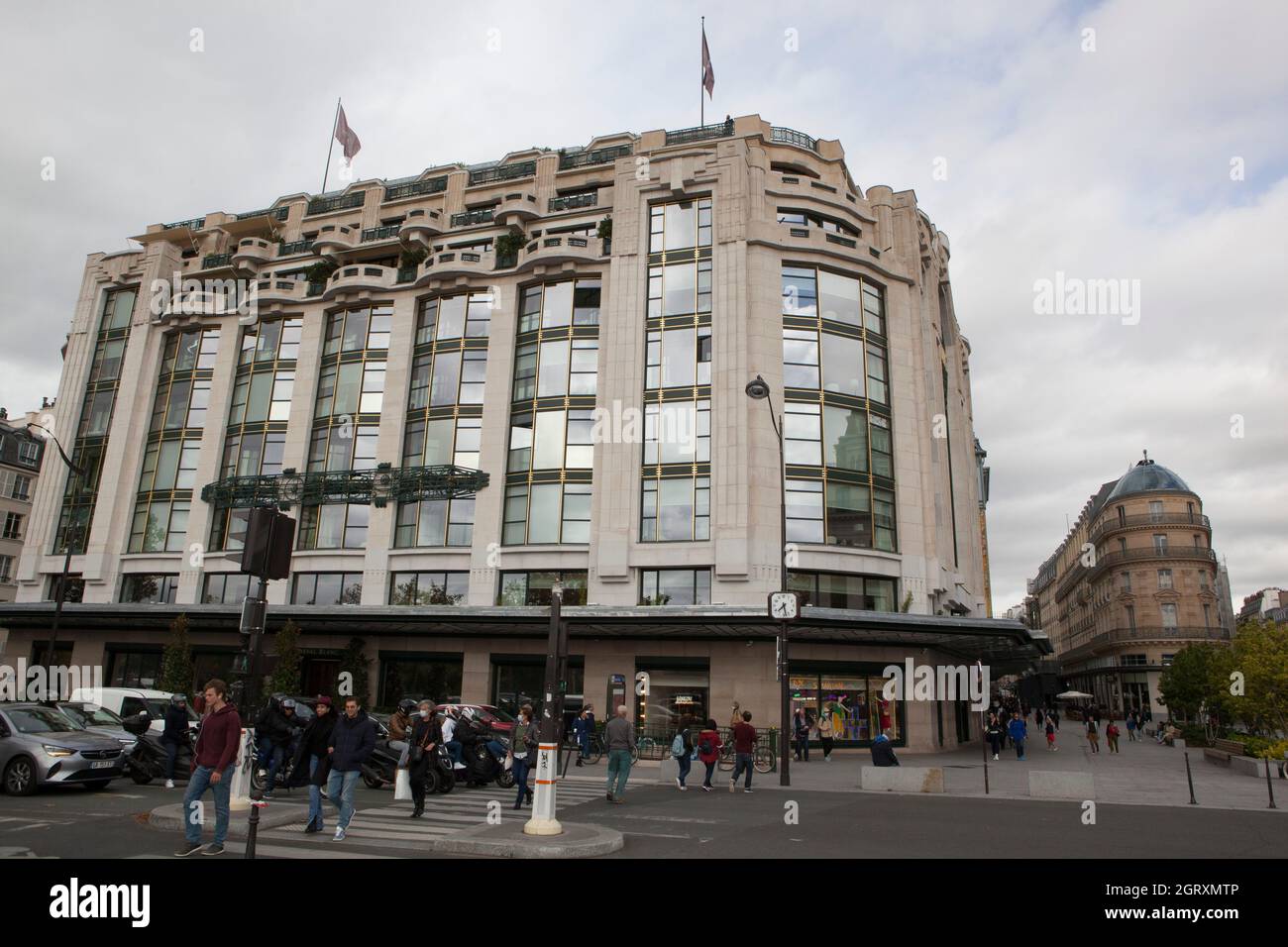 Paris, France, 1 October 2021: The Samaritaine department store has reopened after a long refurbishment which has preserved many of it's art deco and art nouveau features. The building now includes a hotel, the Cheval Blanc, and several spaces for eating and drinking, most notably under the glass roof surrounded by murals of peacocks. On the ground floor the 'Boutique de Loulou' sells gift items while the rest of the store is devoted to luxury designer brands. Anna Watson/Alamy Live News Stock Photo