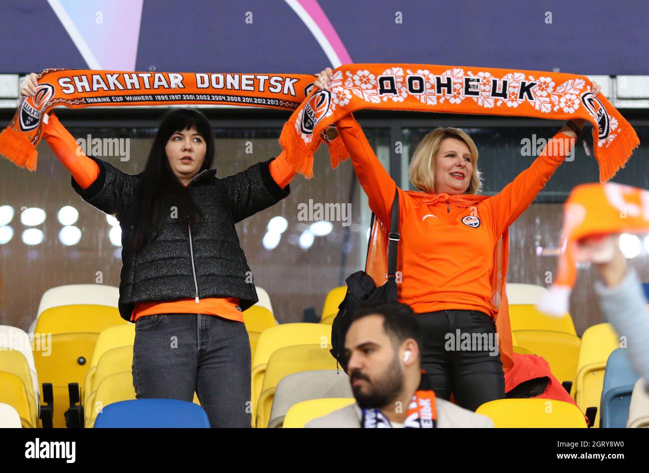 KYIV, UKRAINE - SEPTEMBER 28, 2021: Shakhtar Donetsk supporters show their support during the UEFA Champions League game against Internazionale at NSC Olimpiyskyi stadium in Kyiv, Ukraine Stock Photo