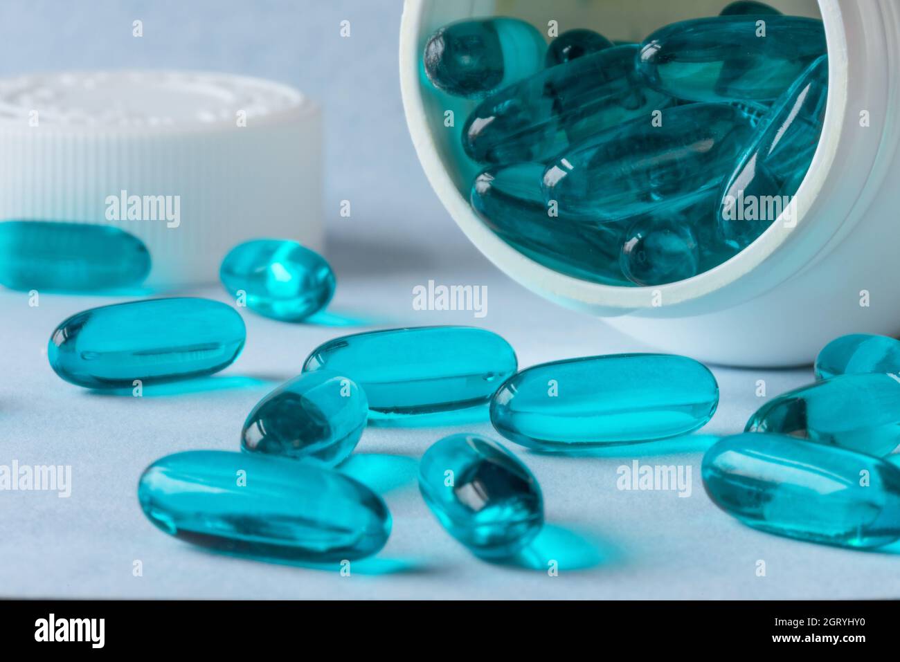 Ibuprofen Gel Capsules Spilled From The Bottle Stock Photo