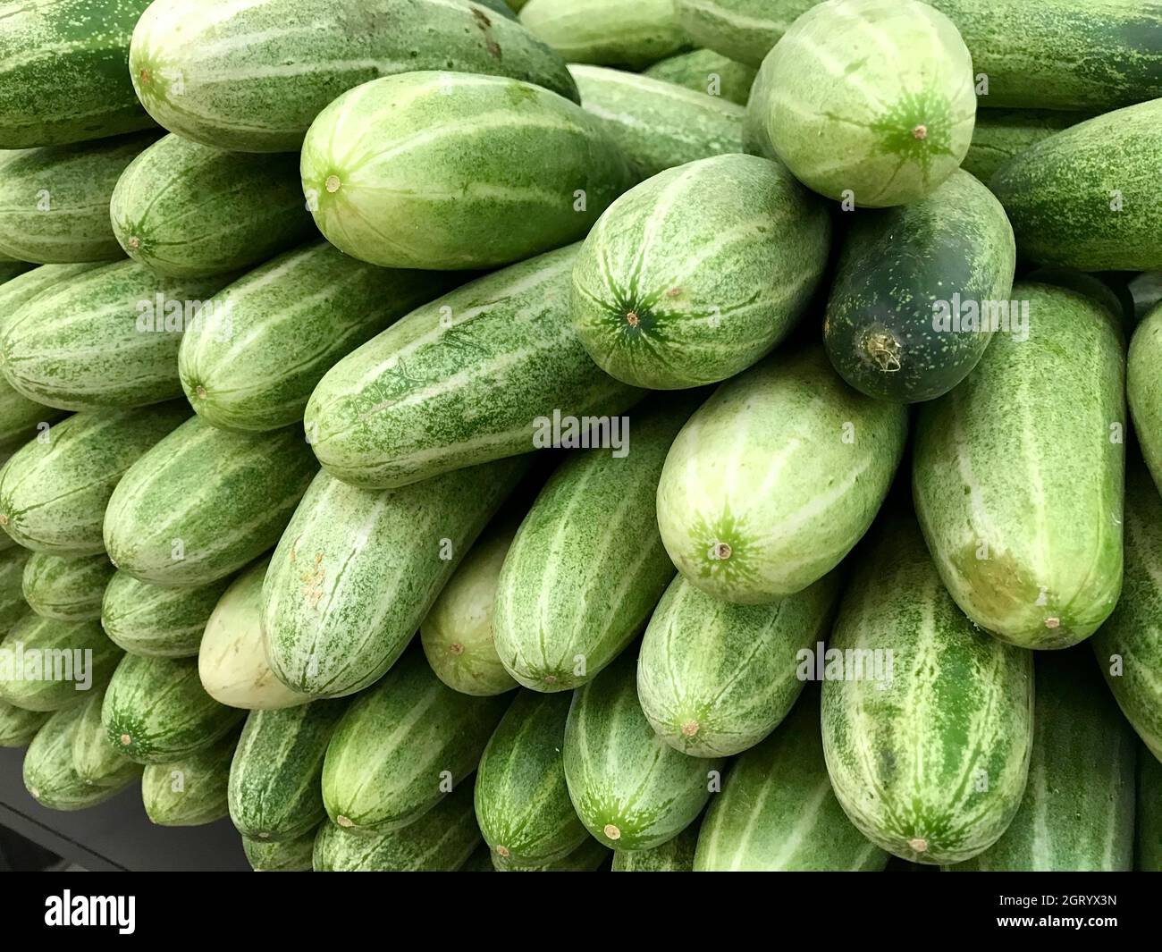 Full Frame Shot Of Cucumber For Sale At Market Stall Stock Photo