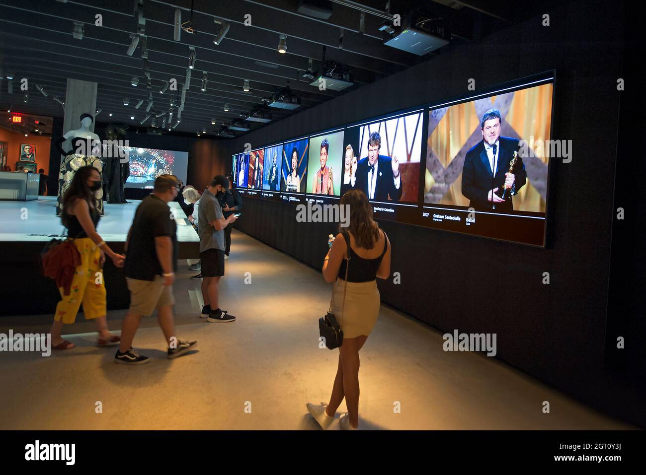 Display with screens show Oscar Award acceptance speeches at the Academy Museum of Motion Pictures in Los Angeles, California Stock Photo