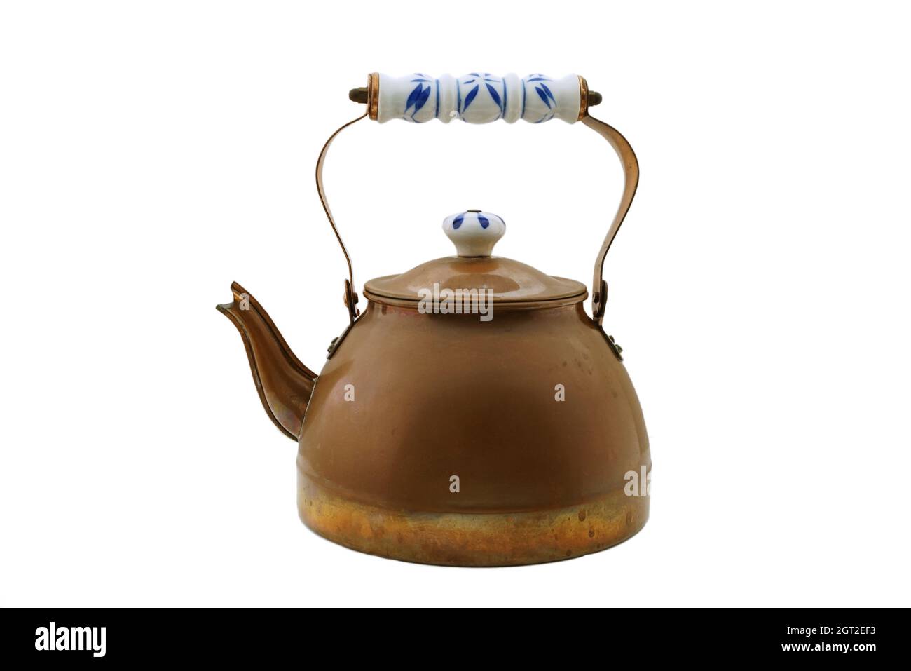Close-up Of Tea Kettle Against White Background Stock Photo