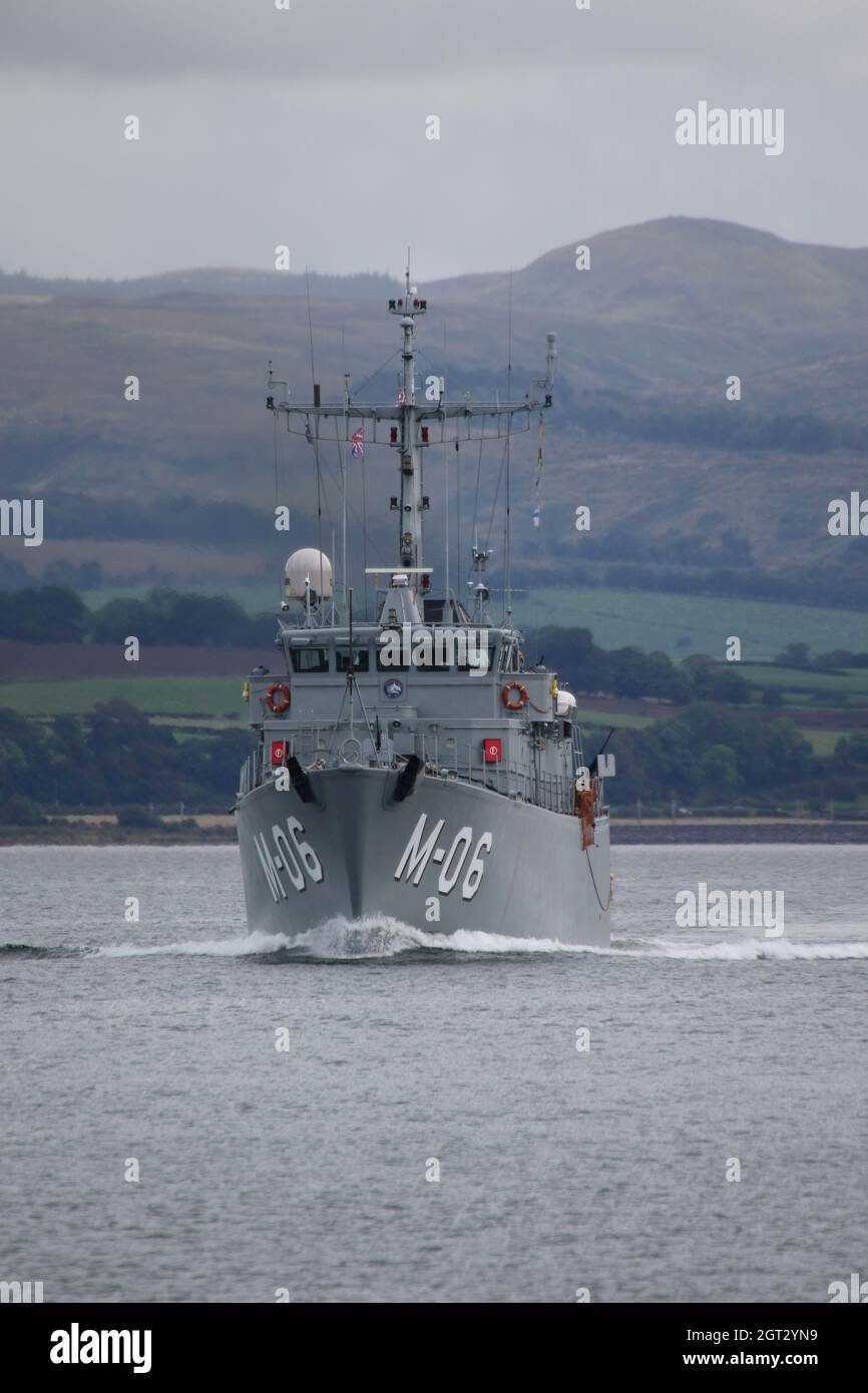 LVNS Talivaldis (M-06), an Alkmaar-class (Tripartite) minehunter operated by the Latvian Navy, passing Greenock on the Firth of Clyde, as she heads out to take part in the military exercises Dynamic Mariner 2021 and Joint Warrior 21-2. This vessel once served in the Royal Netherlands Navy before being decommissioned and sold to Latvia. Stock Photo