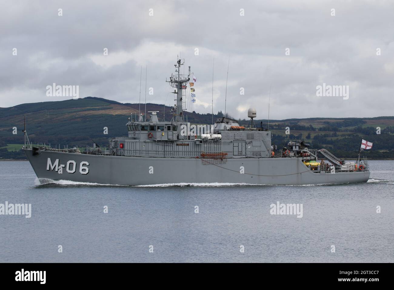 LVNS Talivaldis (M-06), an Alkmaar-class (Tripartite) minehunter operated by the Latvian Navy, passing Greenock on the Firth of Clyde, as she heads out to take part in the military exercises Dynamic Mariner 2021 and Joint Warrior 21-2. This vessel once served in the Royal Netherlands Navy before being decommissioned and sold to Latvia. Stock Photo