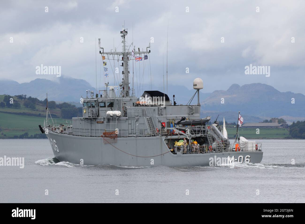 LVNS Talivaldis (M-06), an Alkmaar-class (Tripartite) minehunter operated by the Latvian Navy, passing Greenock on the Firth of Clyde, as she heads out to take part in the military exercises Dynamic Mariner 2021 and Joint Warrior 21-2. This vessel once served in the Royal Netherlands Navy before being decommissioned and sold to Latvia. Stock Photo