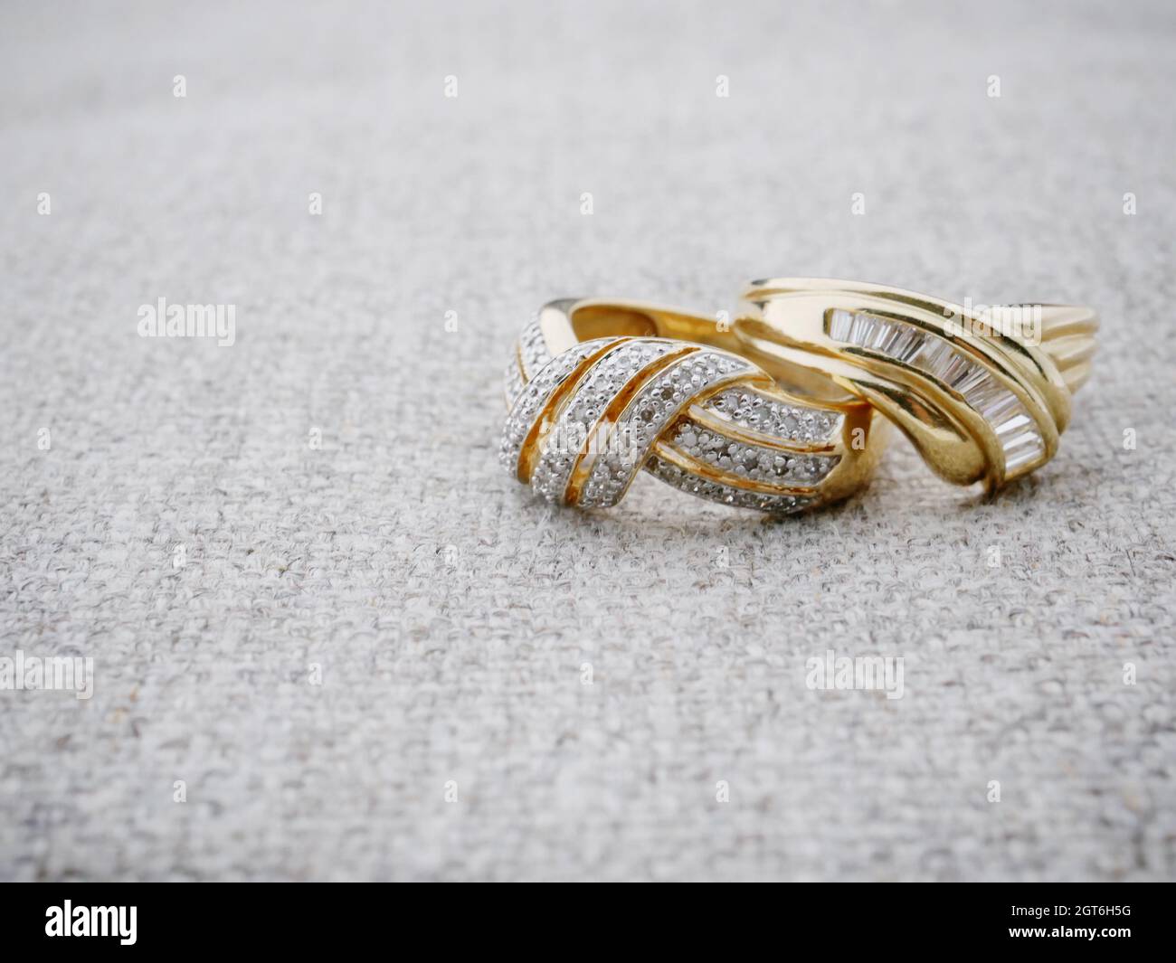 High Angle View Of Wedding Rings On Table Stock Photo
