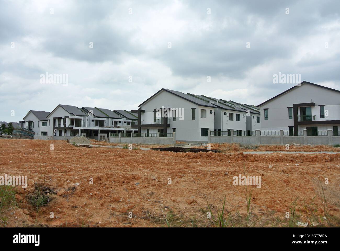 Modern farmhouse luxury home exterior with in ground pool at 