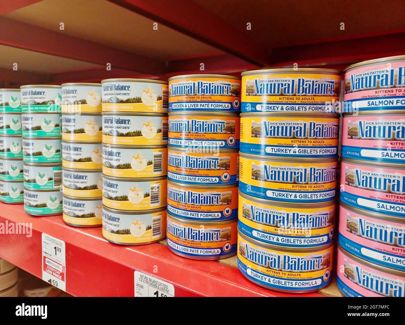 Houston, Texas USA 09-10-2021: Natural Balance brand cat food tins in various flavors stacked up on a market shelf with focus on foreground. Stock Photo