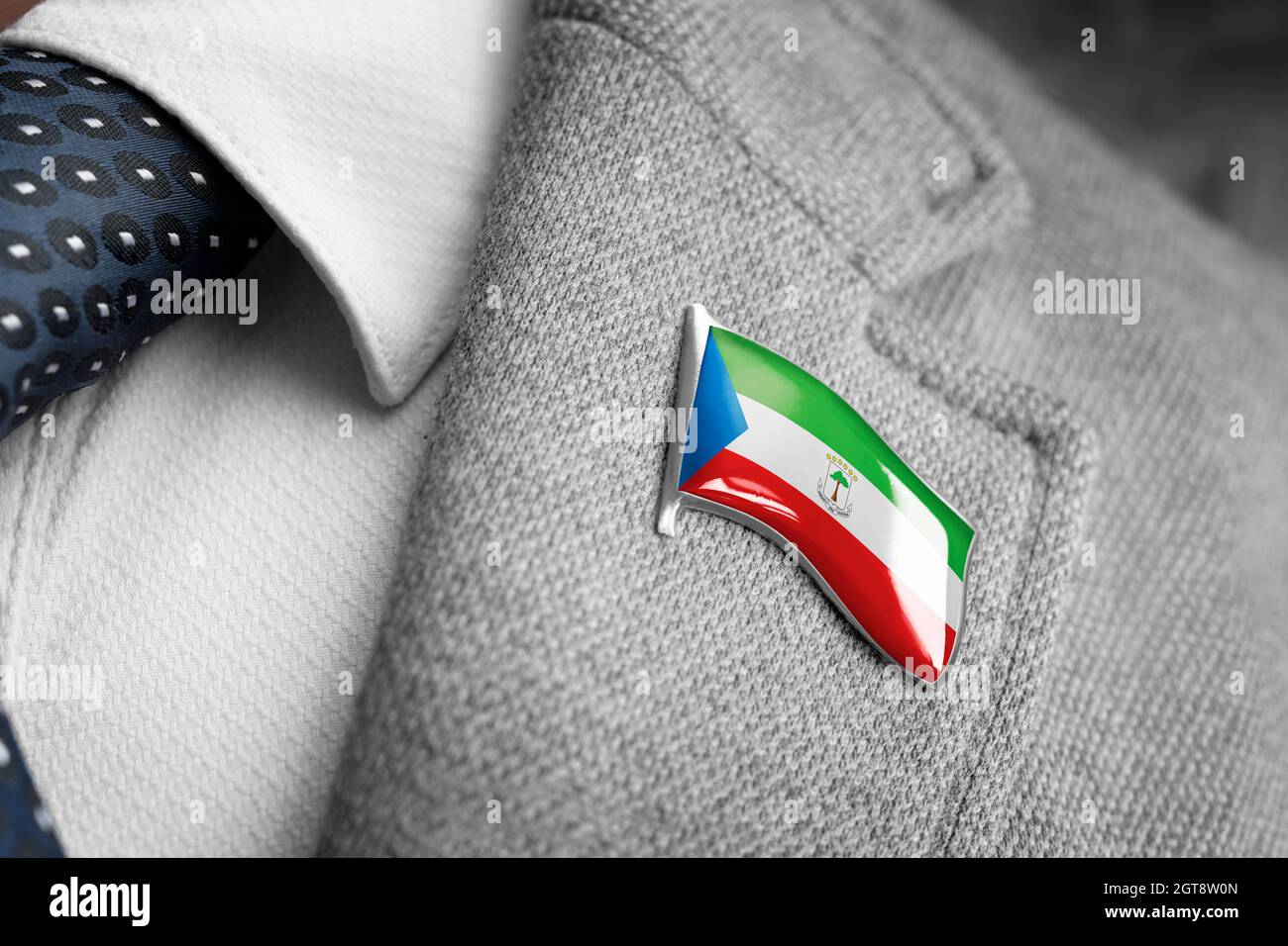 Metal badge with the flag of Equatorial Guinea on a suit lapel Stock Photo