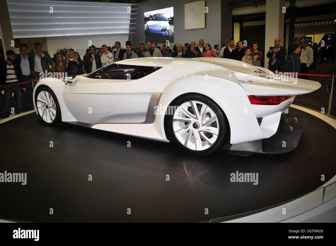 General view of luxury and Citroen GT under lights in showroom, November 02.2012 Istanbul Turkey International Auto Show Stock Photo