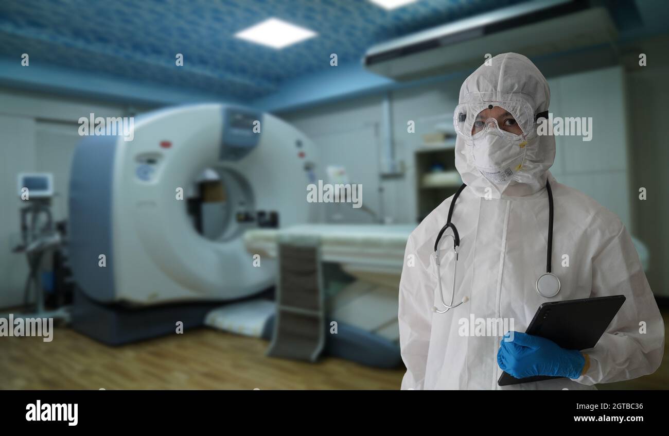 Doctors In Ppe Protective Clothing Are Doing A Ct Scan On Patients