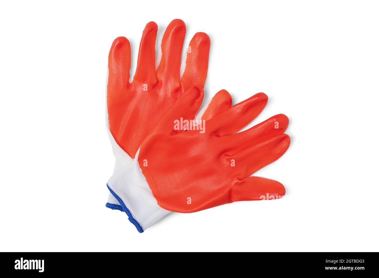 Construction workers gloves with rubber orange coating Stock Photo