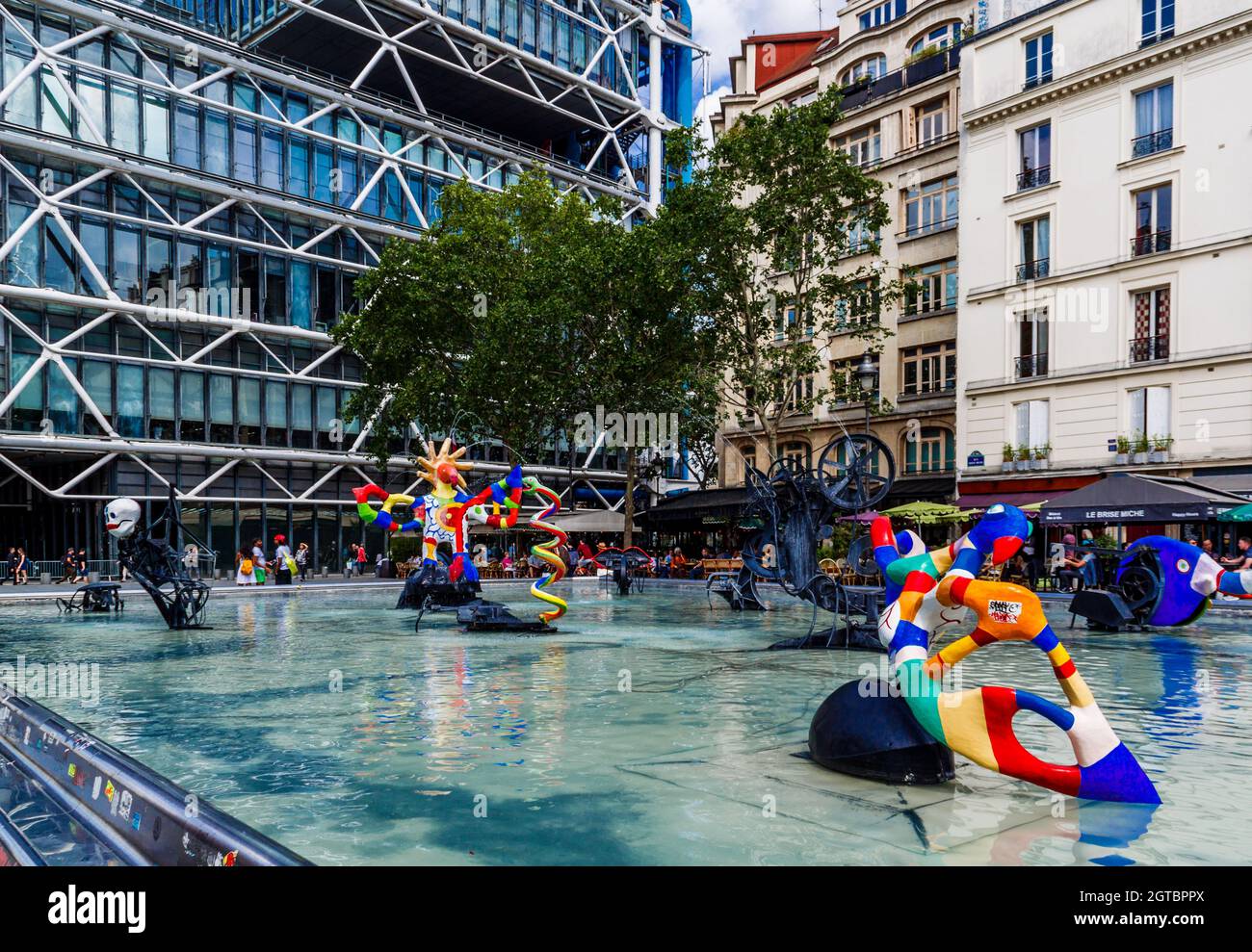 Paris, France - June 04, 2018: Stravinsky fountain with background centre Pompidou. This is a fountain featuring 16 sculptures. Stock Photo