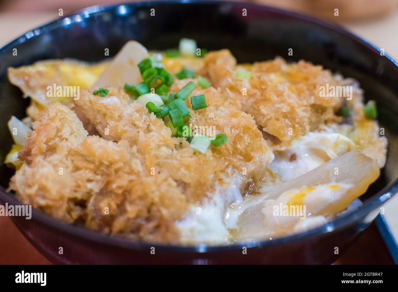 Tonkatsu Pork Tempura With Egg And Spring Onion On Top Stock Photo Alamy