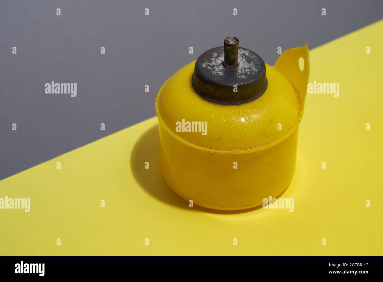 Yellow Oil Lamp On The Yellow Background Stock Photo Alamy