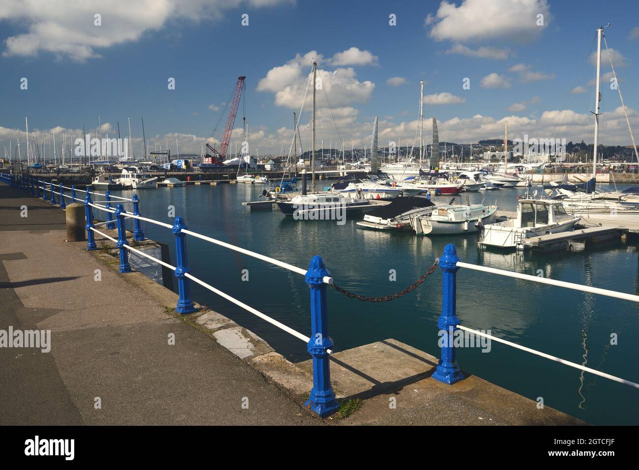 Freshly painted railings around the inner dock at Torquay harbour ...