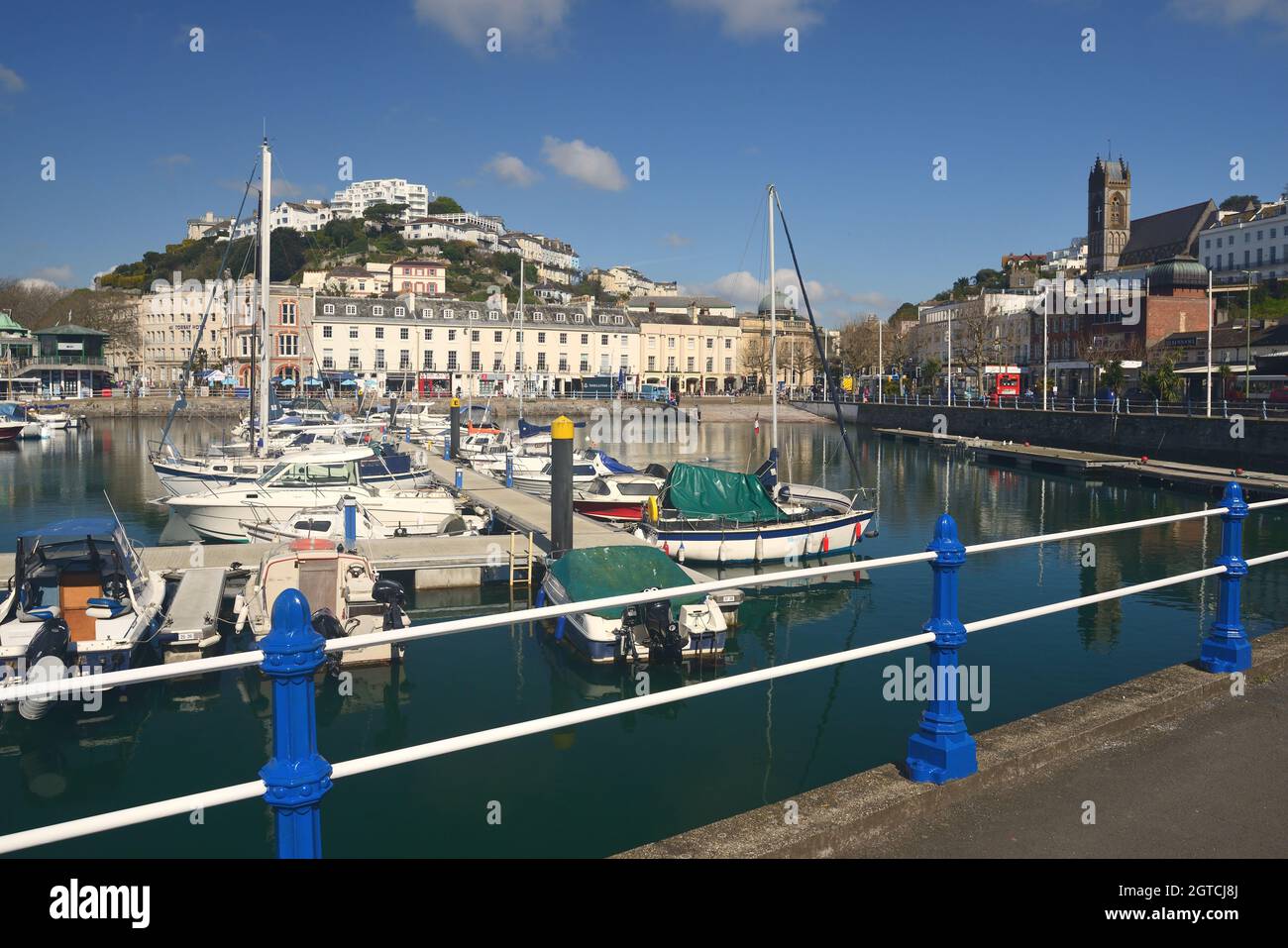 Freshly painted railings around the inner dock at Torquay harbour ...