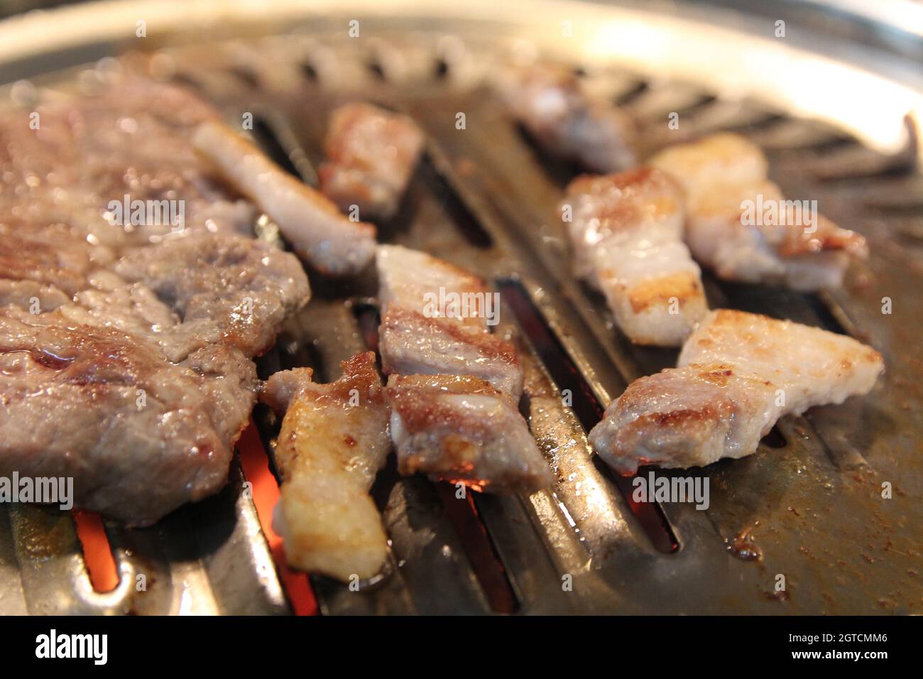 Korean Grilled Pork Bbq Or Samgyeopsalgui With Charcoal At Korean