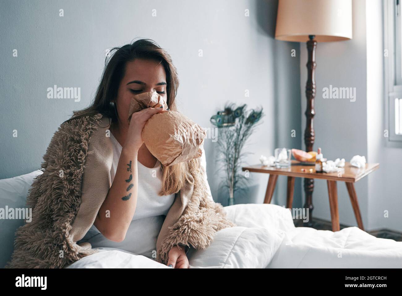 Breathing in paper bag hires stock photography and images Alamy