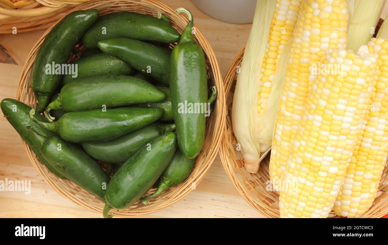 Corn and Green Jalapeno Peppers for Sale at Farmers Market Stock Photo ...