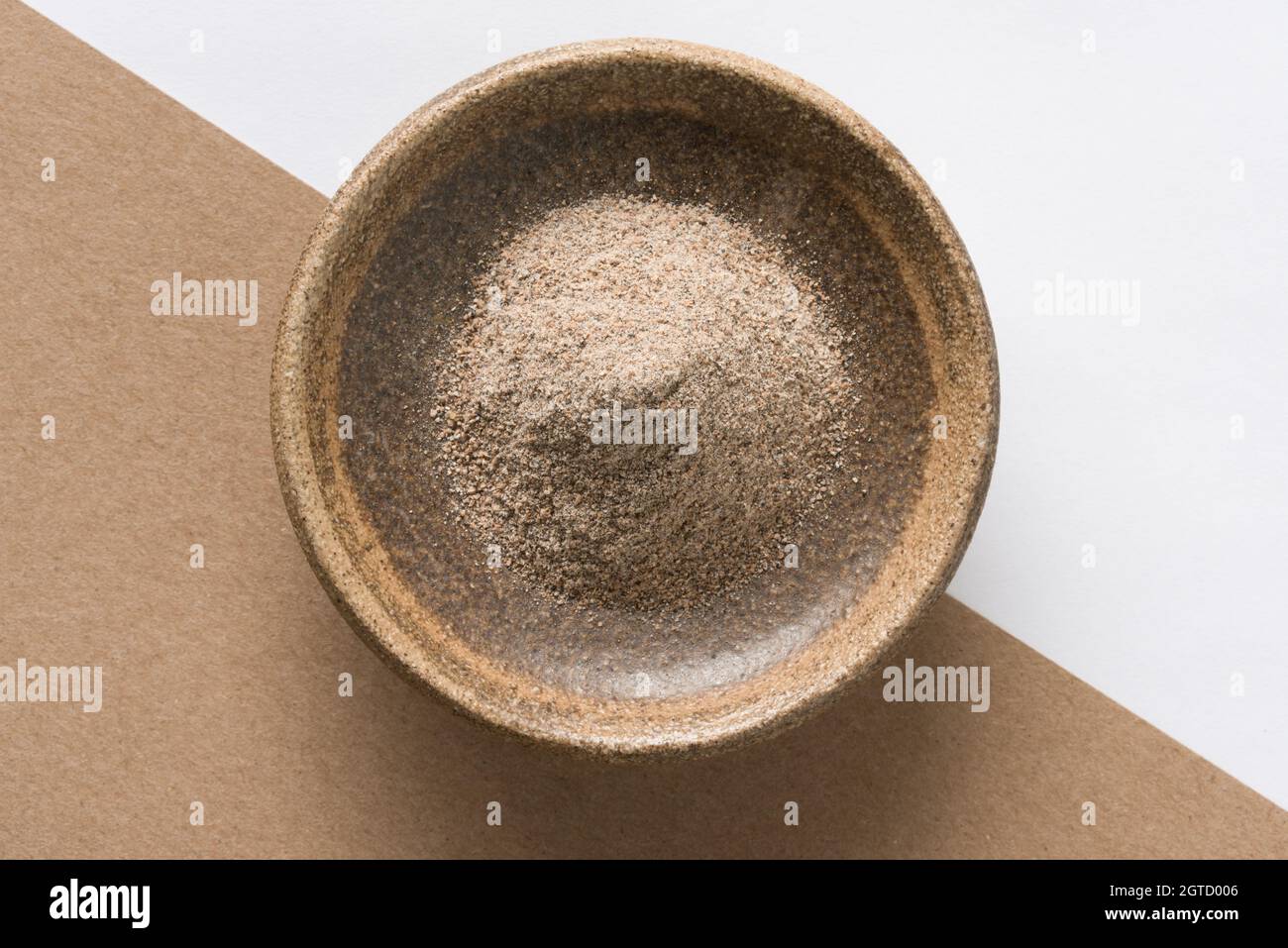 Ground Cardamom In A Bowl Stock Photo