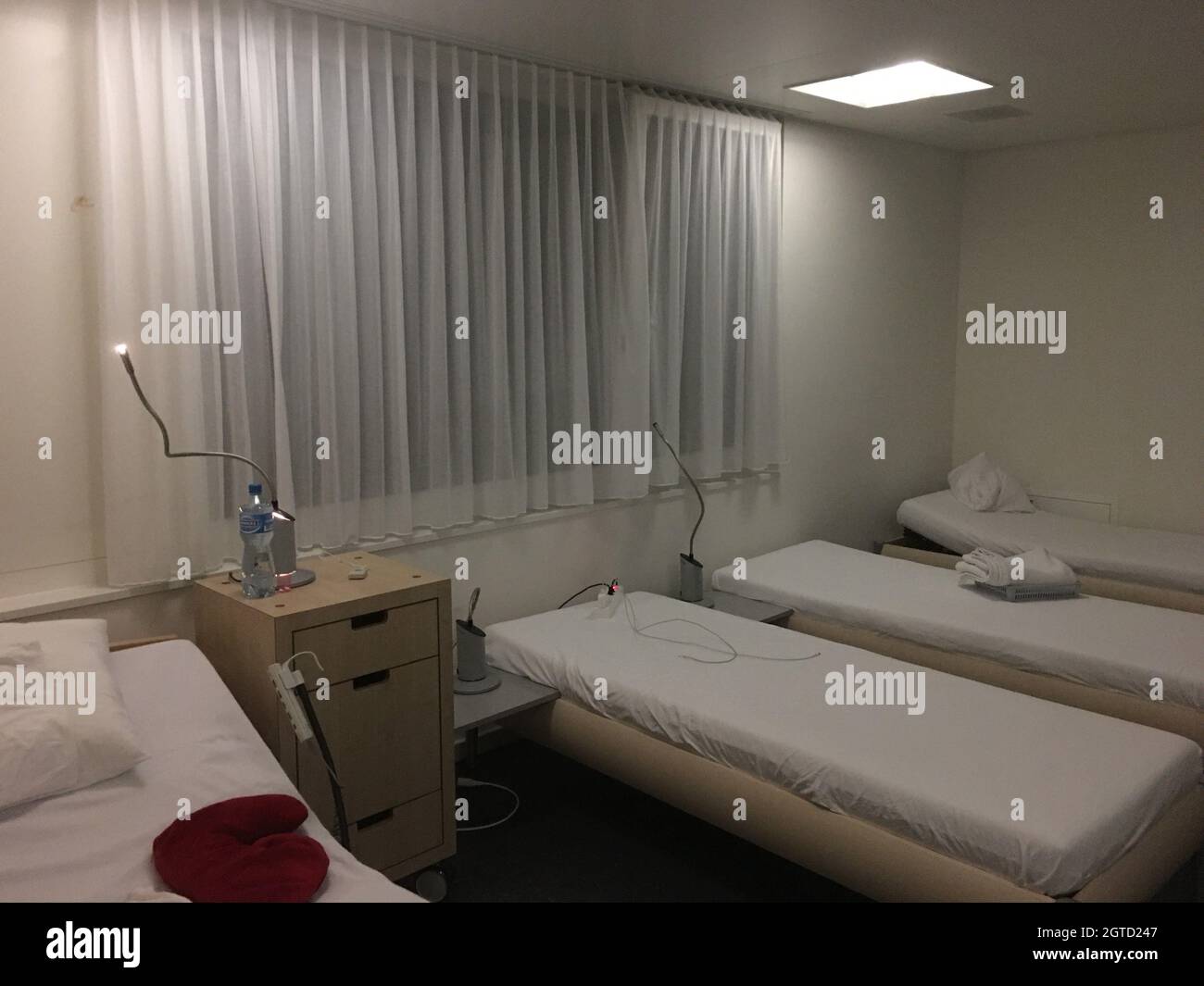 Electric Lamp On Bed Against Wall At Home Hospital Stock Photo Alamy