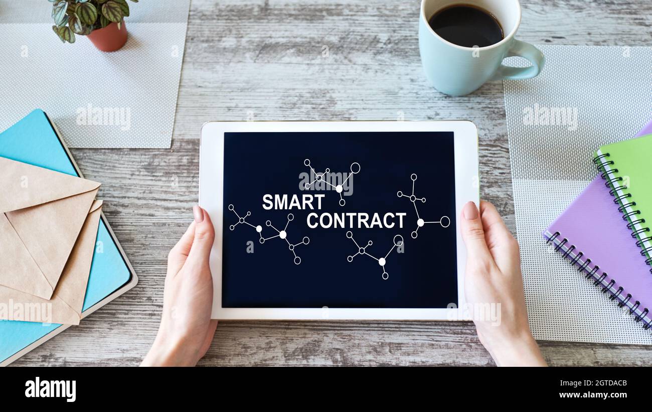 Smart contract blockchain based technology concept on screen. Cryptocurrency, Bitcoin and ethereum. Stock Photo