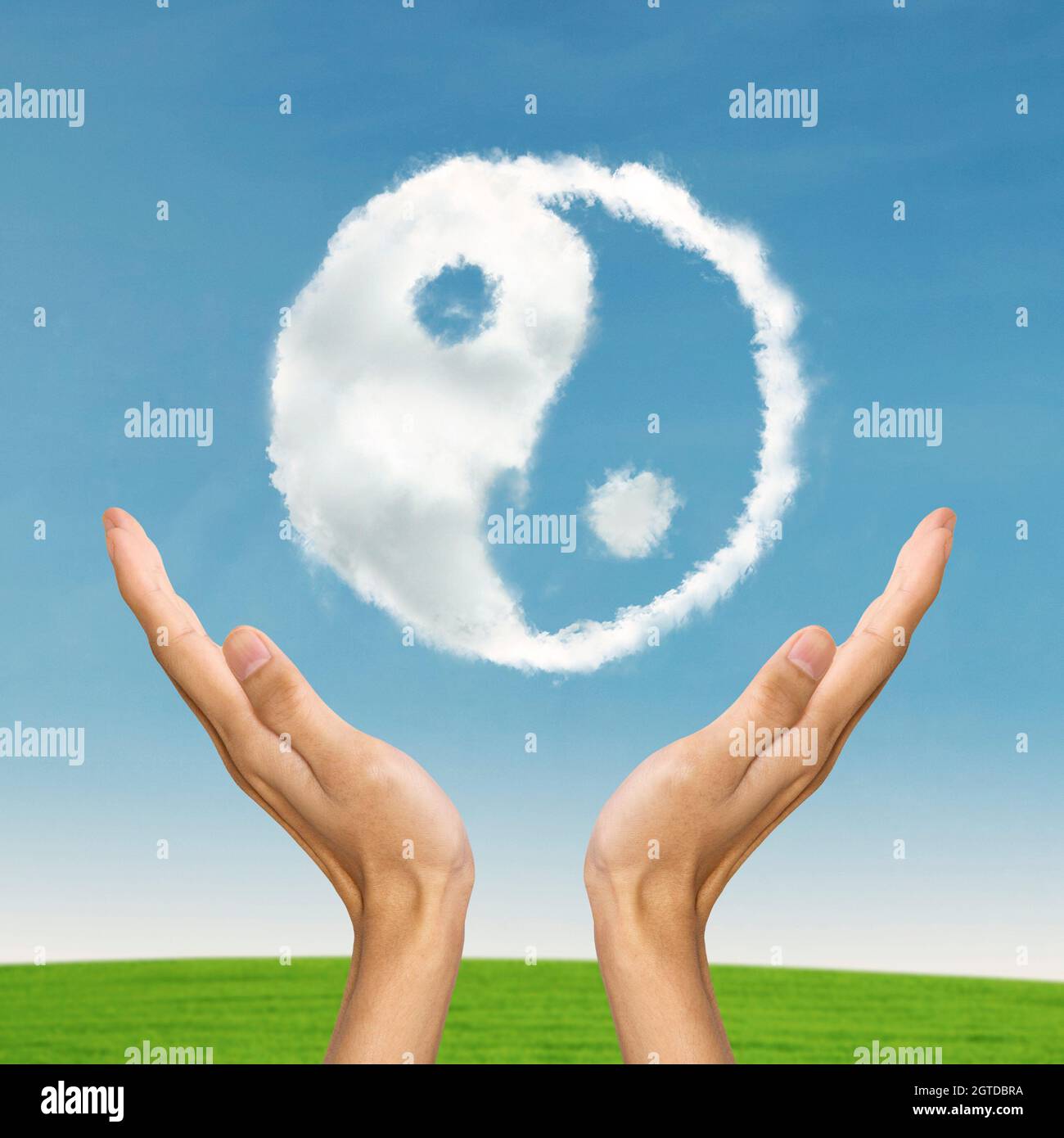 Cropped Hands Holding Yin Yang Symbol Made With Cloud Stock Photo Alamy