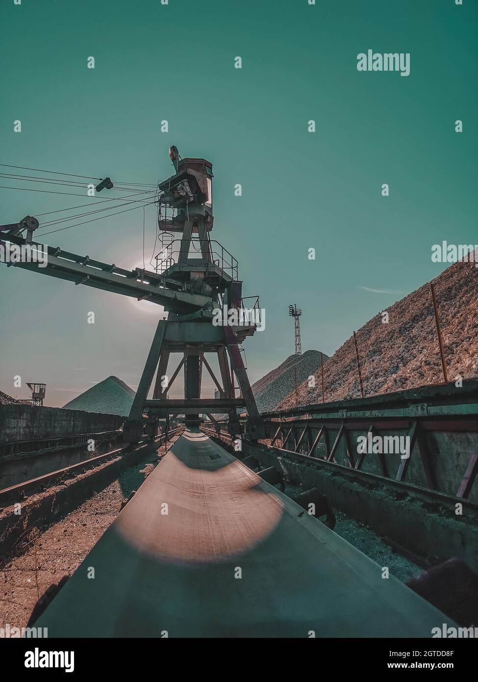 Long conveyor belt in an industrial area Stock Photo Alamy