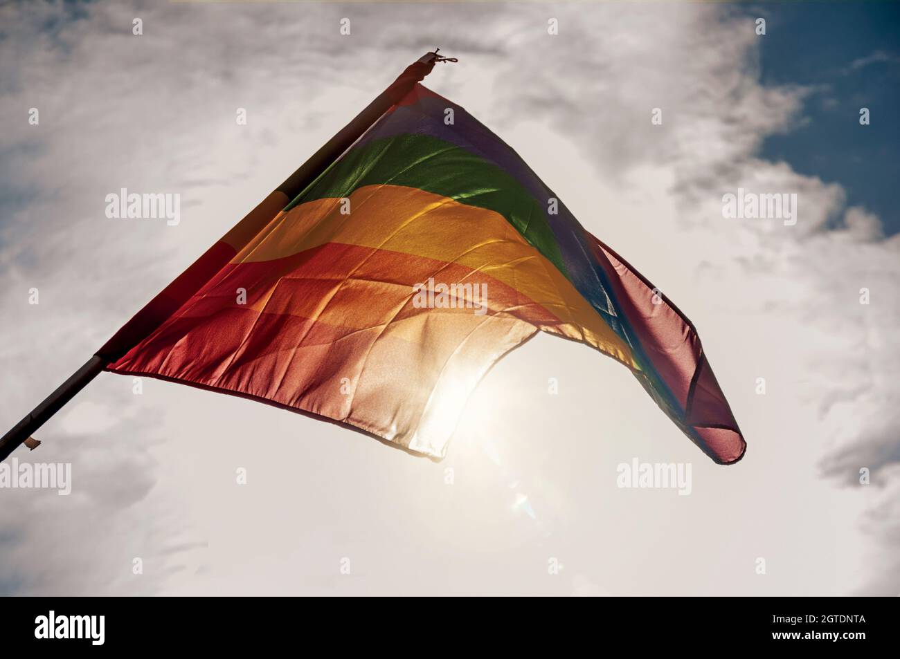 Rainbow Flag Fluttering And Sunlight In S-hertogenbosch. City With Huge Cultural Life In Netherlands Stock Photo