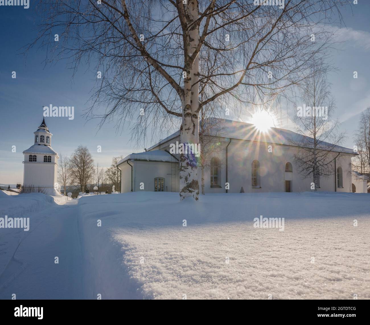 tower with an church in an winter landscape Stock Photo