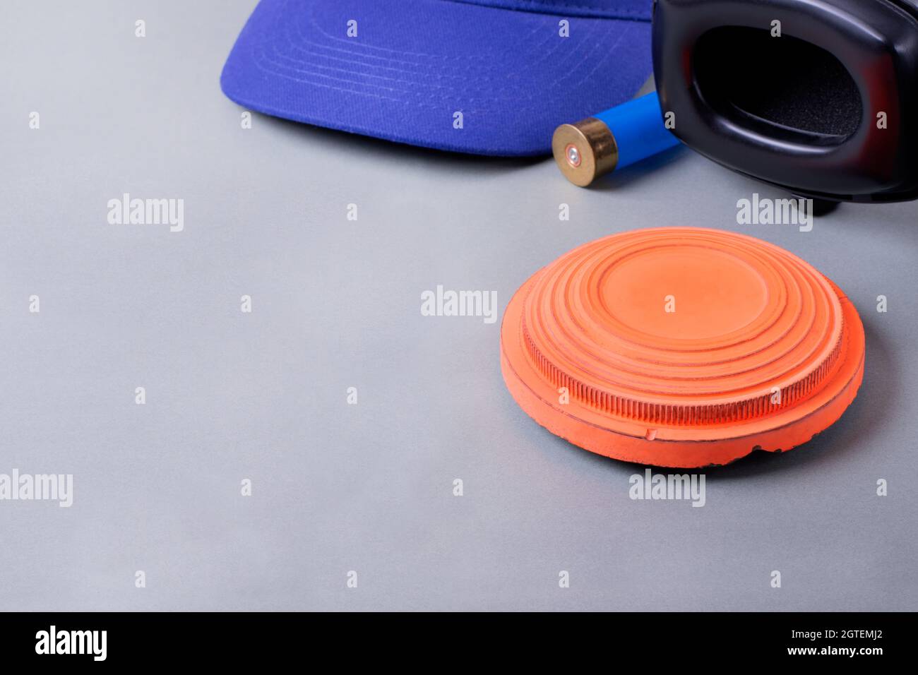 Skeet Shooting. Clay Target, Noise Cancelling Headphones, Bullet Shell