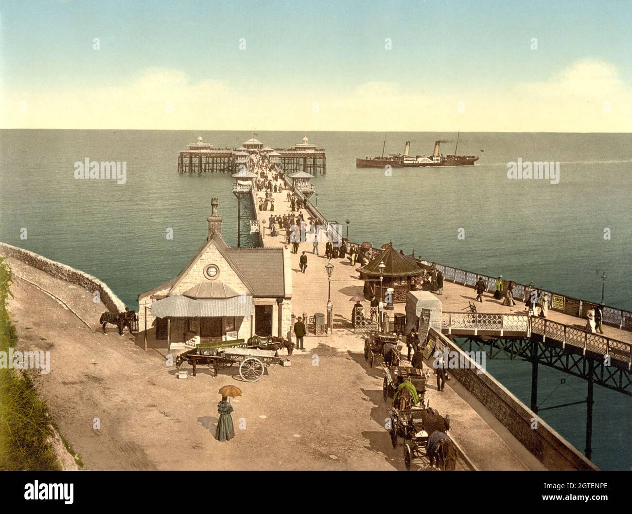 Vintage colour photo circa 1890 of Llandudno Pier on the North Wales coast. The pier is the longest in Wales and was opened to the public on 1 August 1877 and incorporated a landing stage for steam ships Stock Photo