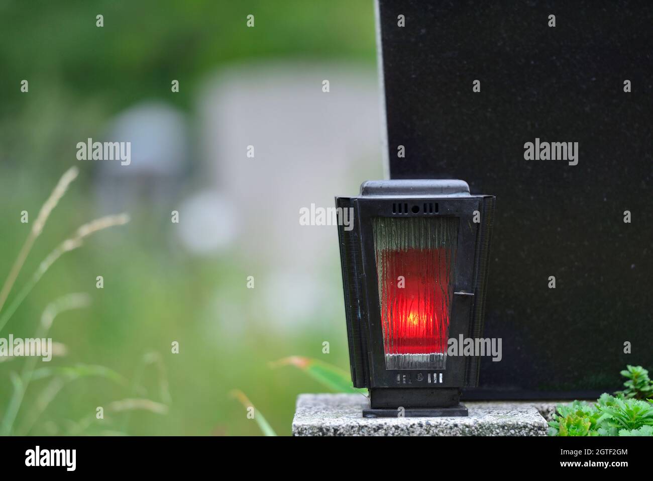 Vienna, Austria. The Vienna Central Cemetery. Grave lantern with burning candle Stock Photo