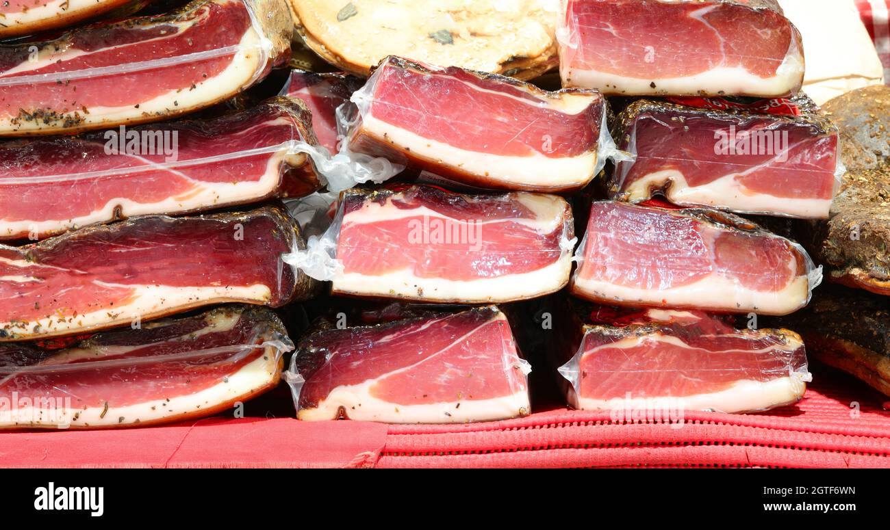 Many Italian Salumi Called Speck For Sale At Supermarket Stock Photo