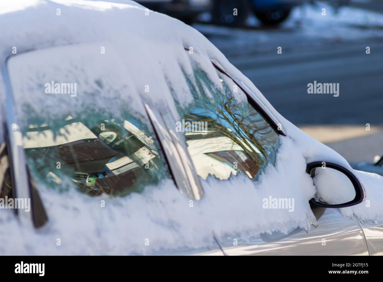 Snow Covered Car With Frozen Windows And Snow On Windows And Snow On