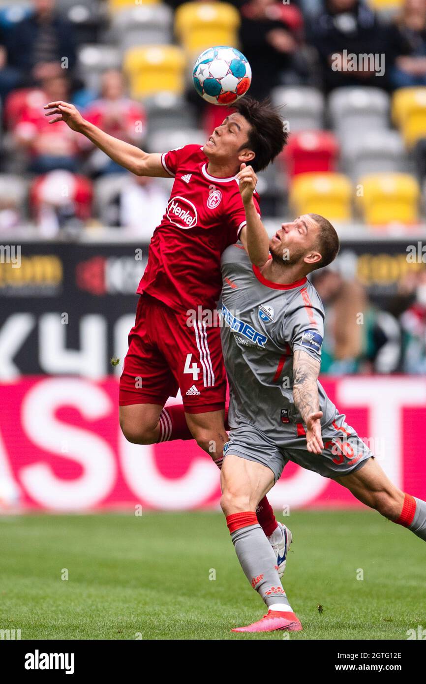 Duesseldorf Germany 02nd Oct 2021 Football 2nd Bundesliga Fortuna Dusseldorf Sc Paderborn 07 Matchday 9 Merkur Spiel Arena Dusseldorf S Ao Tanaka L And Paderborn S Felix Platte Fight For The Ball Credit Marius