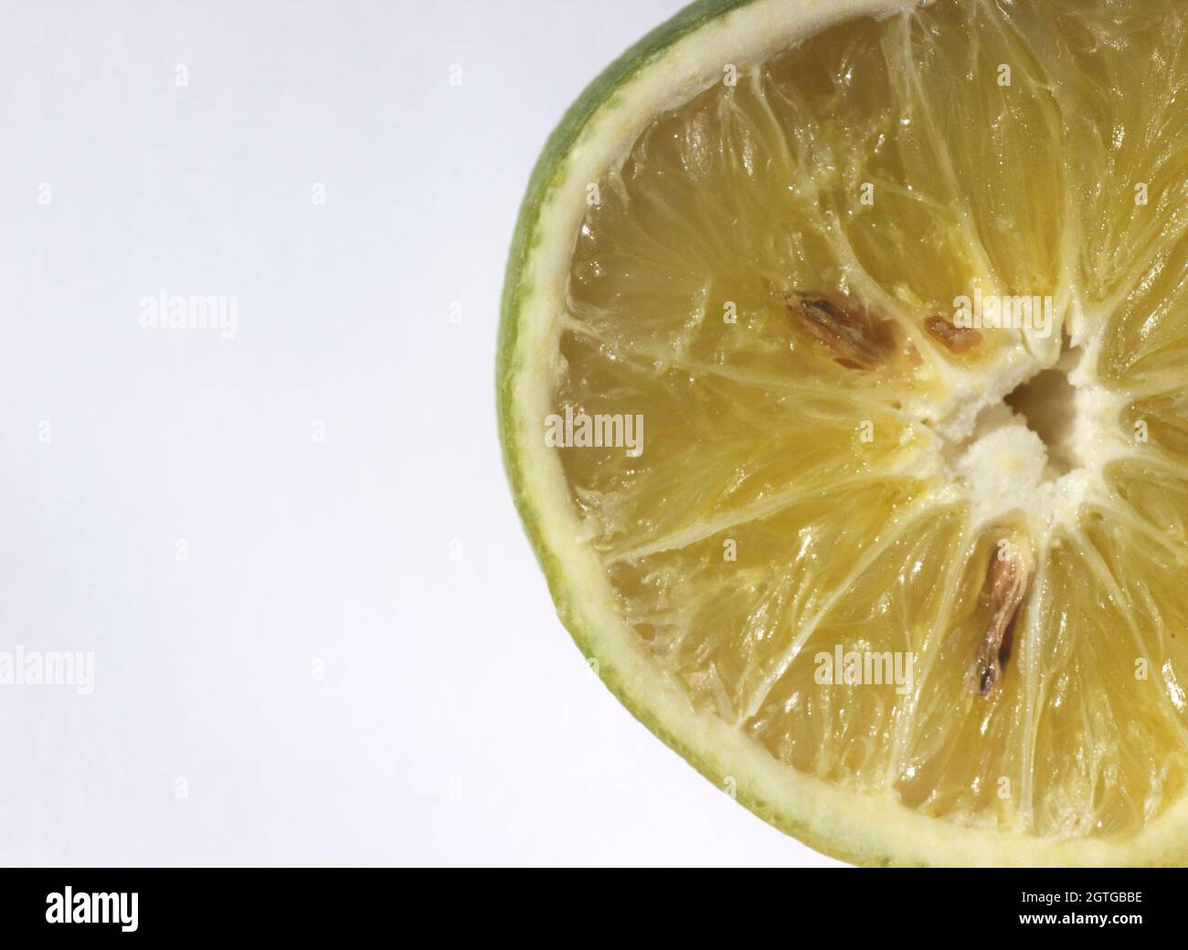 Orange citrus fruit infected with HLB citrus greening Stock Photo
