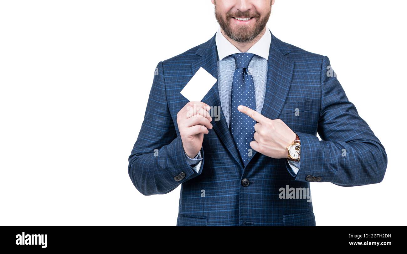 cropped man in suit pointing finger on empty debit or business card for copy space, advertisement. Stock Photo