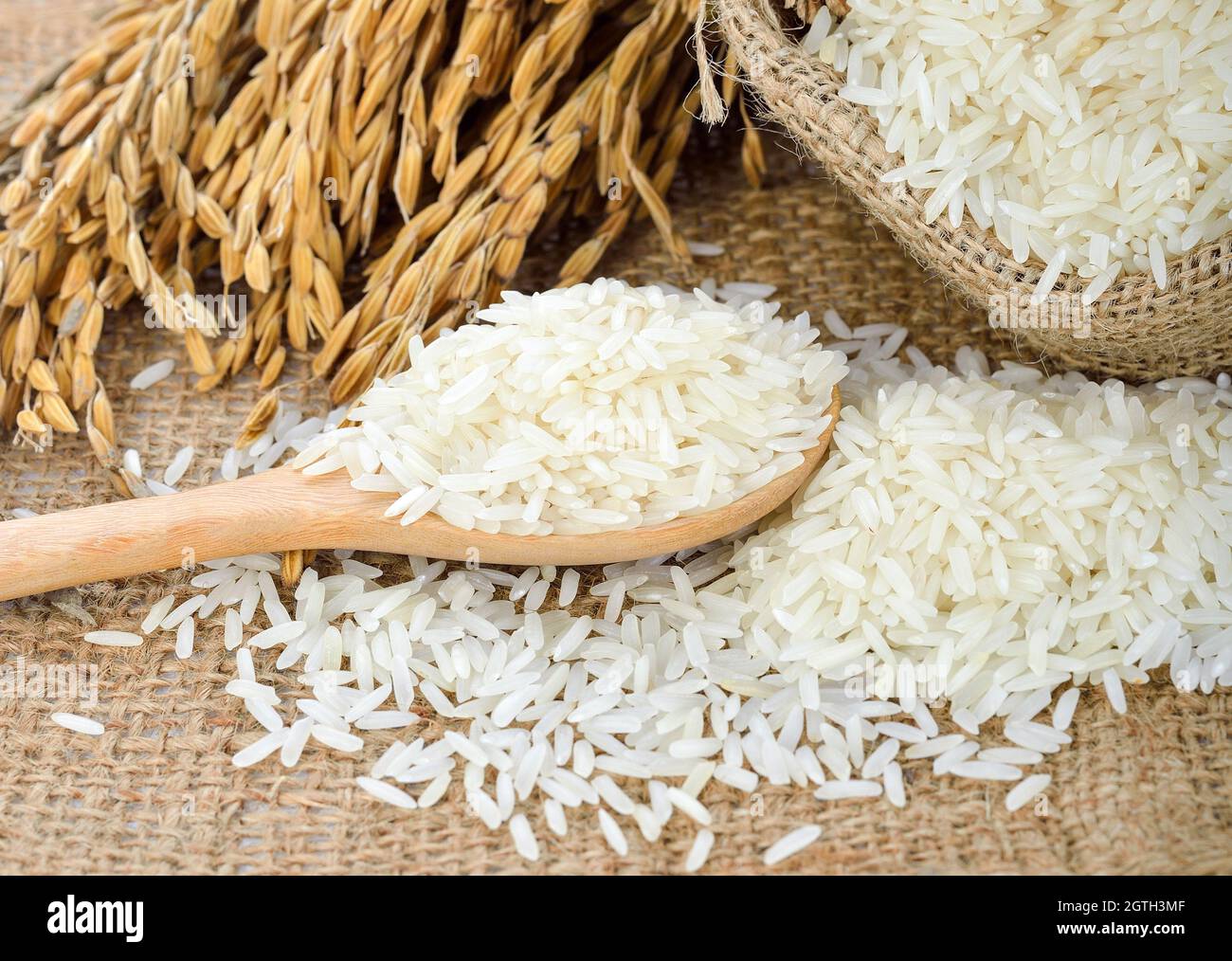White Rice Thai Jasmine Rice And Unmilled Rice Stock Photo Alamy
