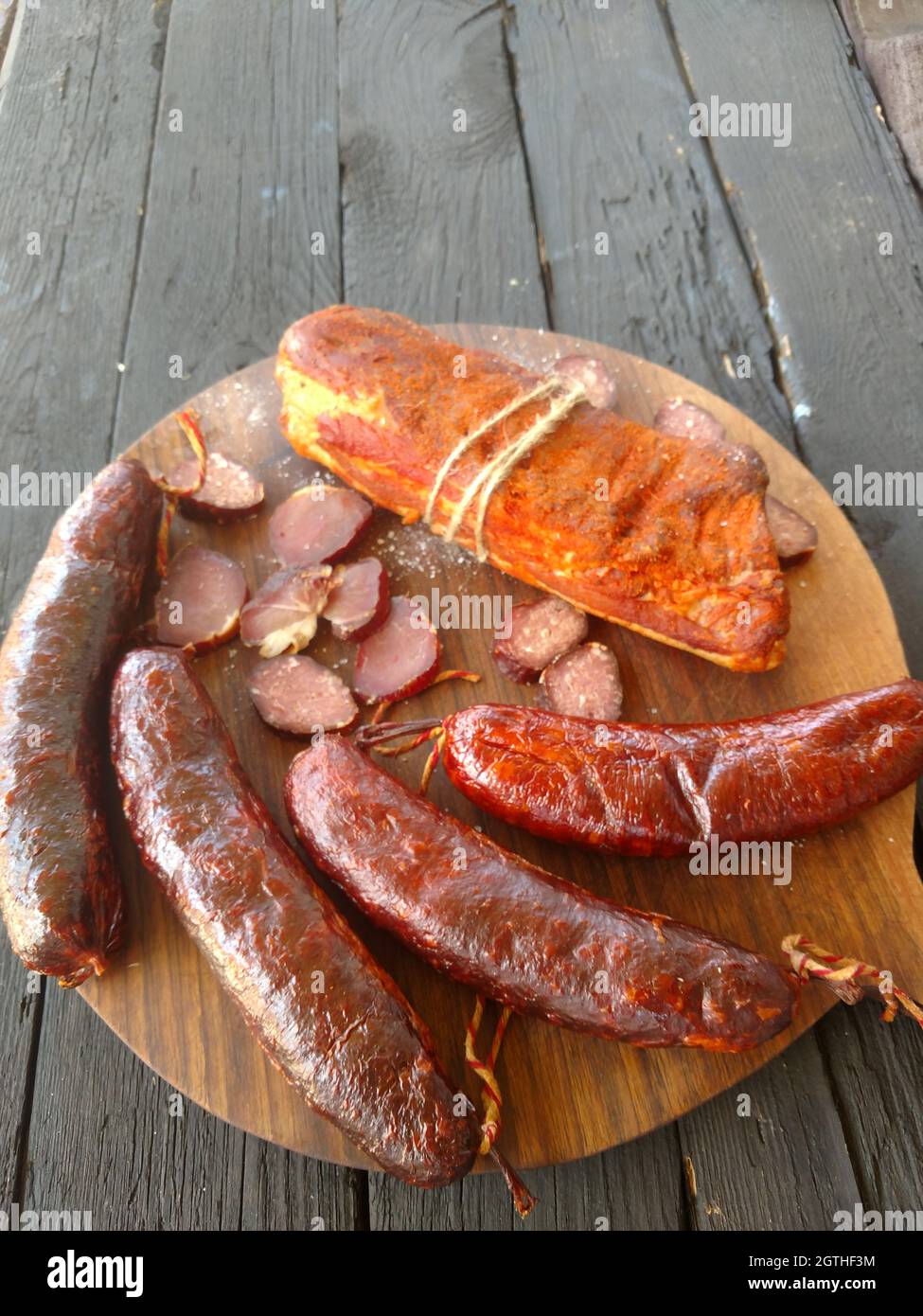 High Angle View Of Home Made Smoked Sausage On Table Stock Photo