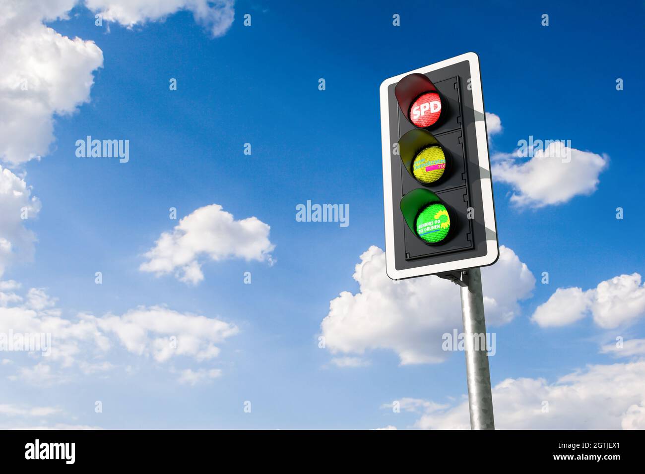 Ampelkoalition (traffic light coalition) concept. The German parties SPD, FDP and Die Gruenen cacn build a so called traffic light coalition derived f Stock Photo